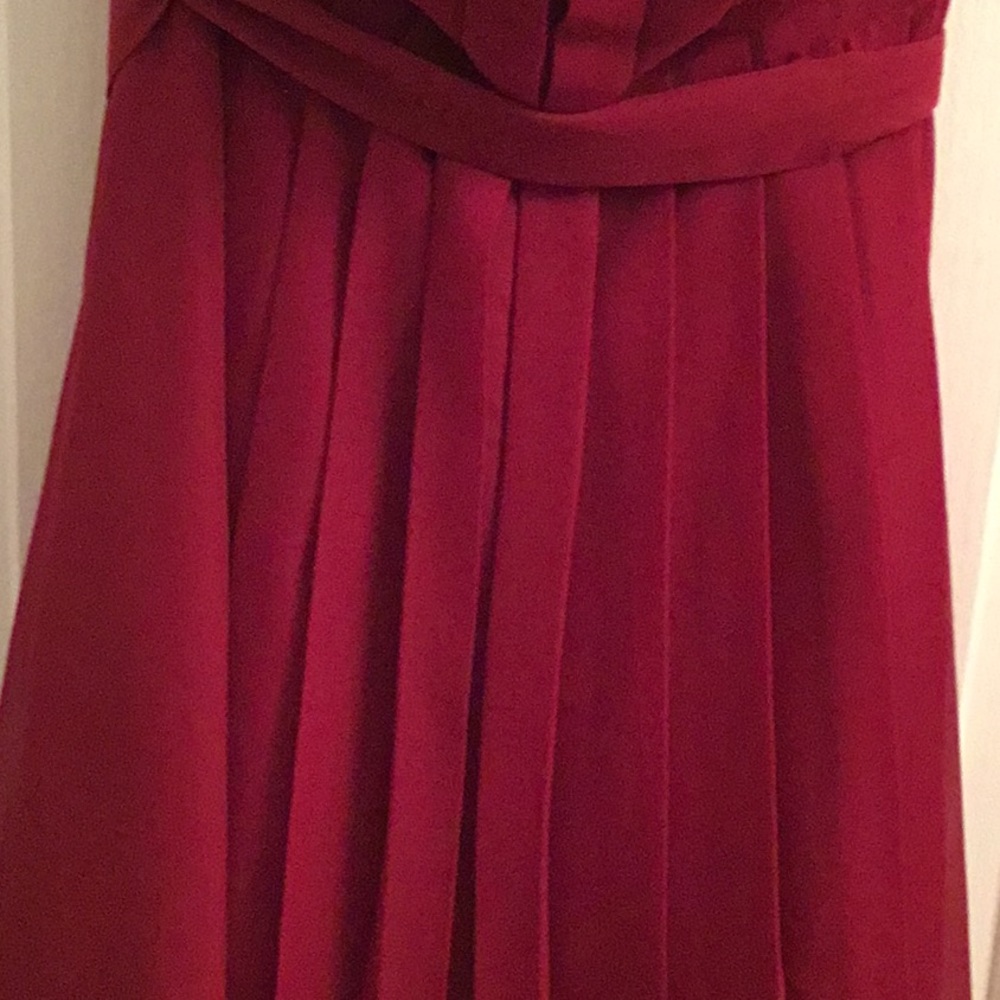 New red strapless pleated dress